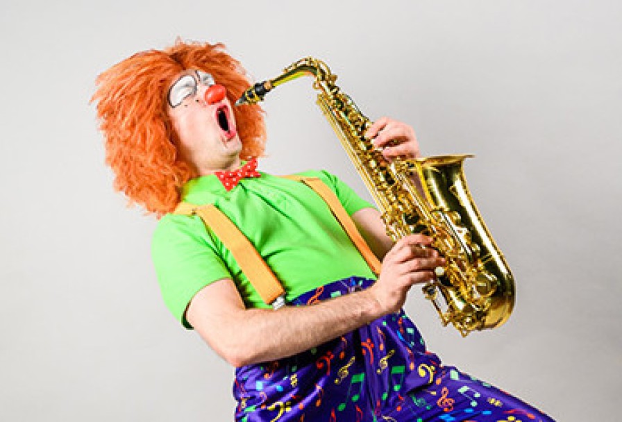 Клоун-Дирижер и Симфонический Оркестр